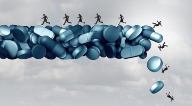 Opioid health risk and medical crisis with a prescription painkiller addiction epidemic concept as a group of people running away from a dangerous falling bridge of pills as a medicine addict problem with 3D illustration elements.